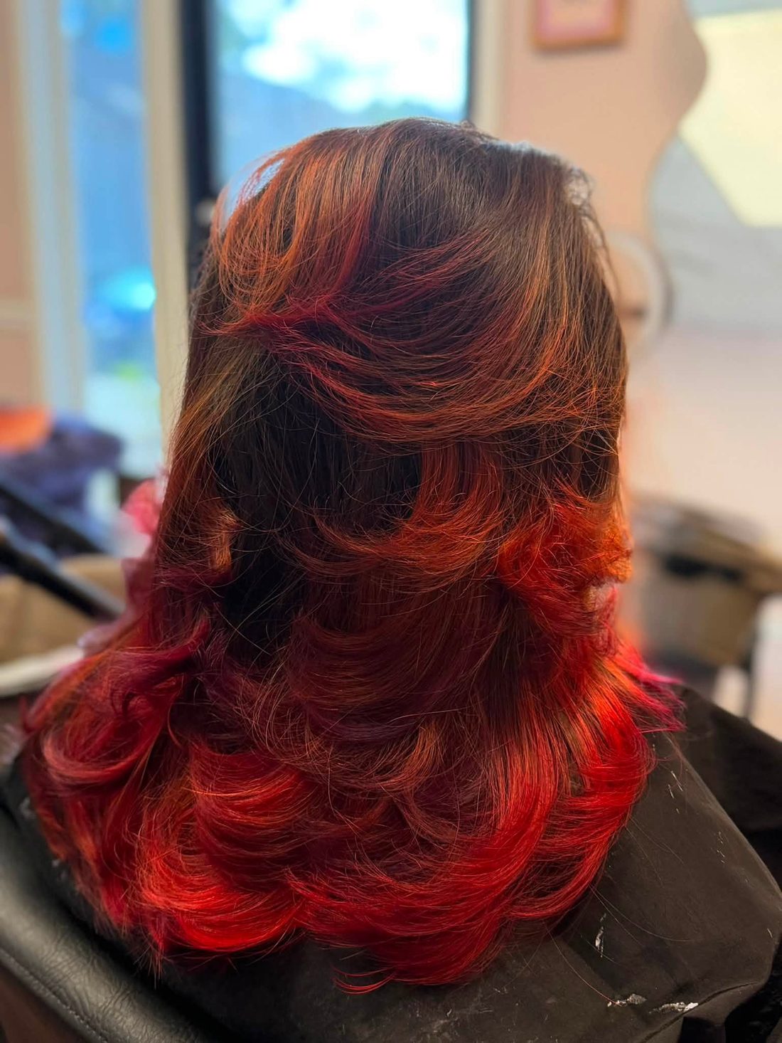 Copper balayage melting into blonde ends, styled by Velvet Color Co.
