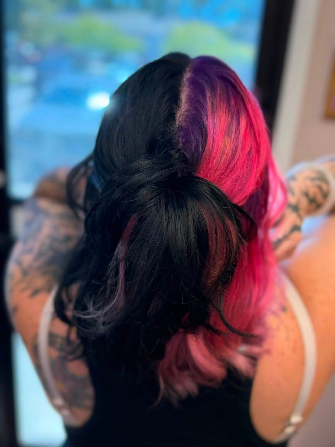 Vivid red color with a full curled blowout by Velvet Color Co.